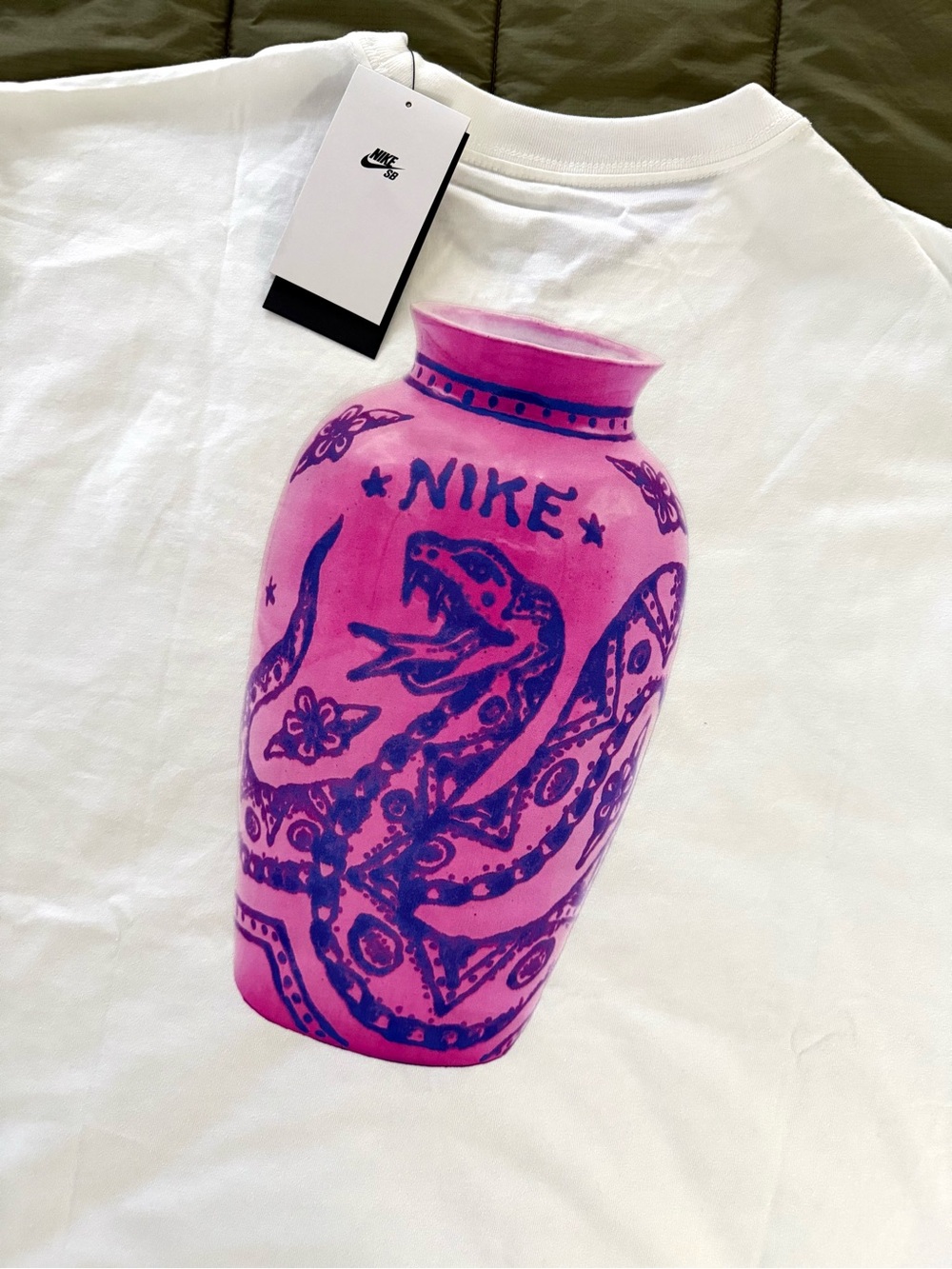 Nike SB Loose Fit T-Shirt with snake vase graphic on back Embroidered Logo chest